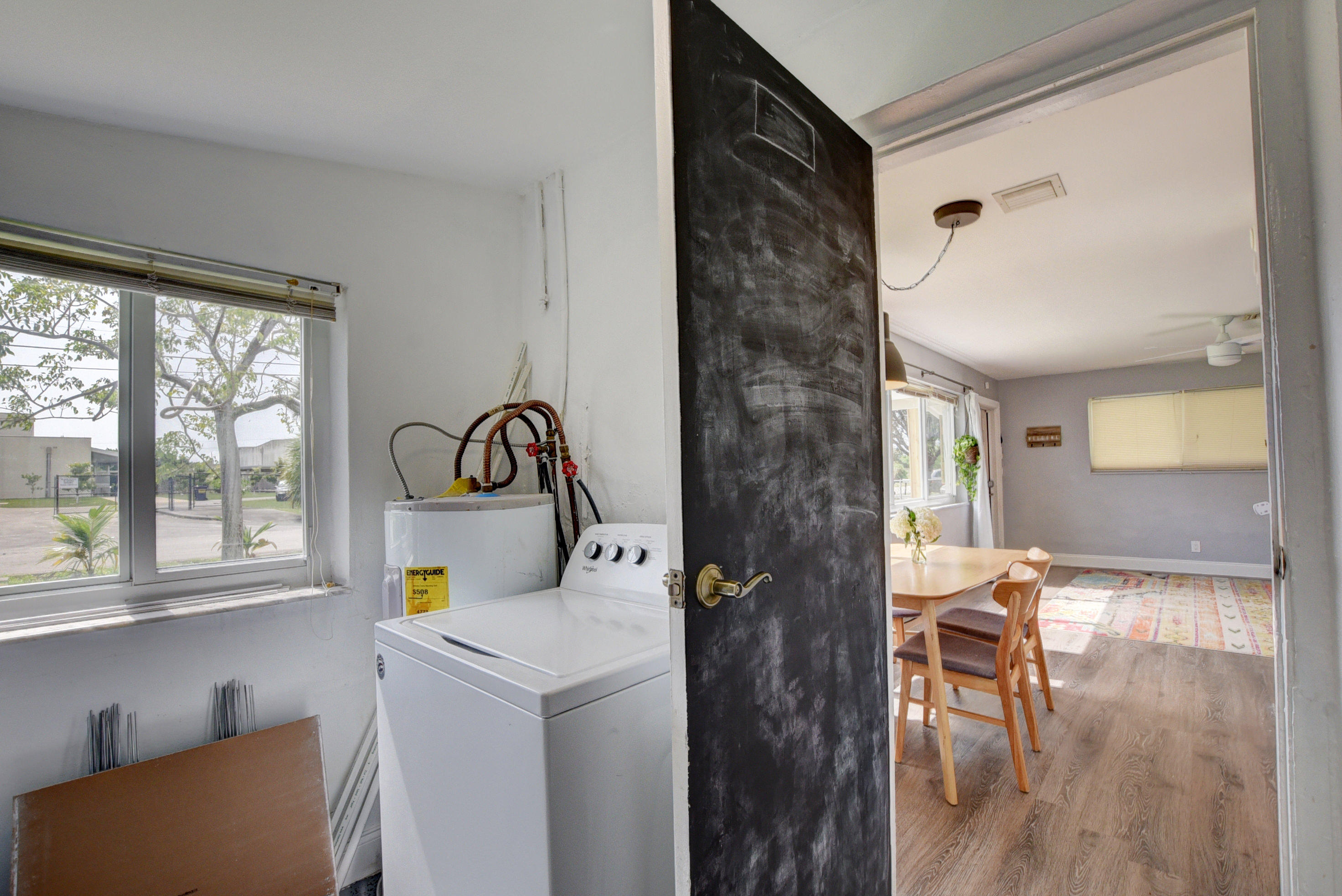 418 Southwest 14th Avenue Delray Beach, FL 33444 - Photo 11 of 29 Laundry Room w/ Washer & Water Heater