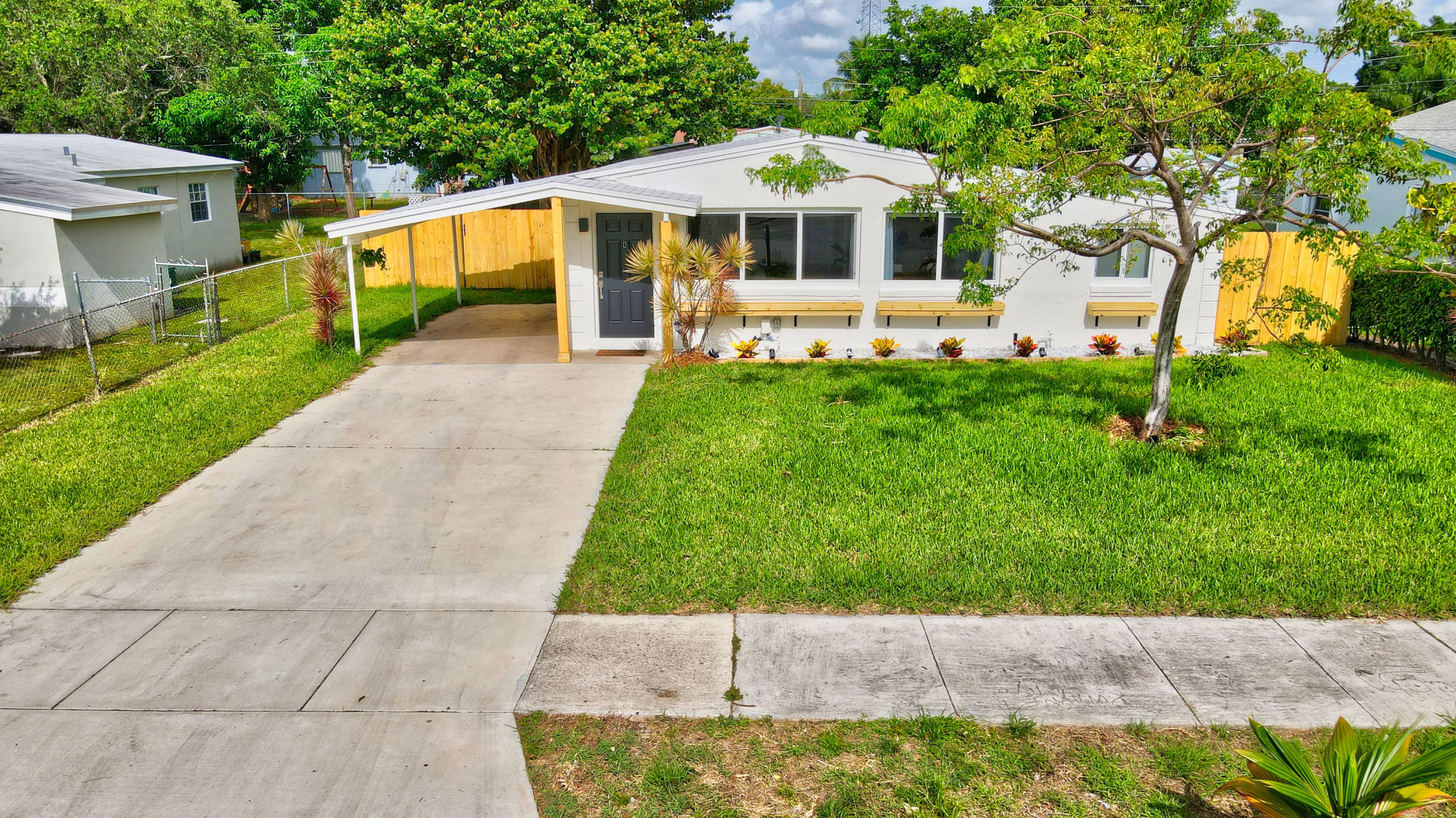 418 Southwest 14th Avenue Delray Beach, FL 33444 - Photo 2 of 29 Front Landscape Drone Profile