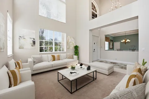 a view of a dining room with furniture window and outside view