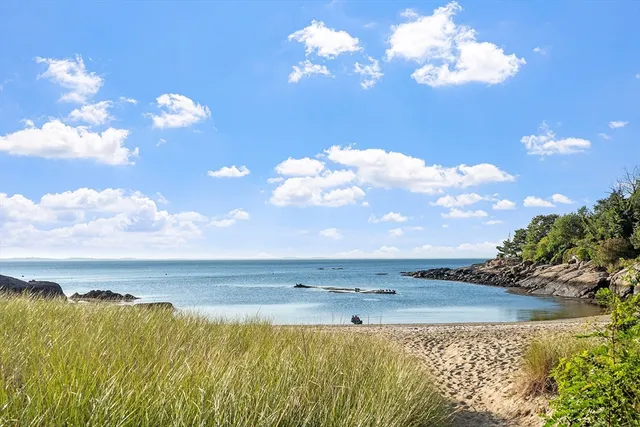 a view of a lake with sunset