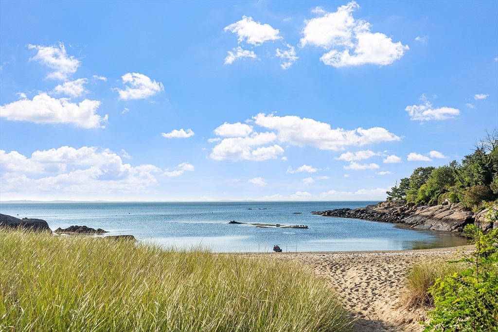 1101 Washington Street, Unit WINTER Gloucester, MA 01930 - Photo 13 of 41 a view of a lake with sunset