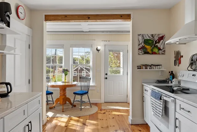 a workspace with furniture and a window