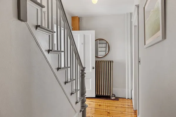 a view of front door with stairs