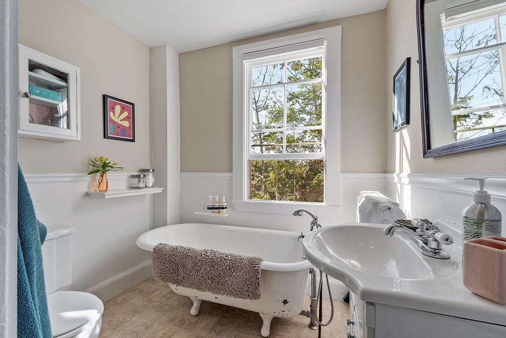 1101 Washington Street, Unit WINTER Gloucester, MA 01930 - Photo 34 of 41 a bathroom with a sink and a toilet