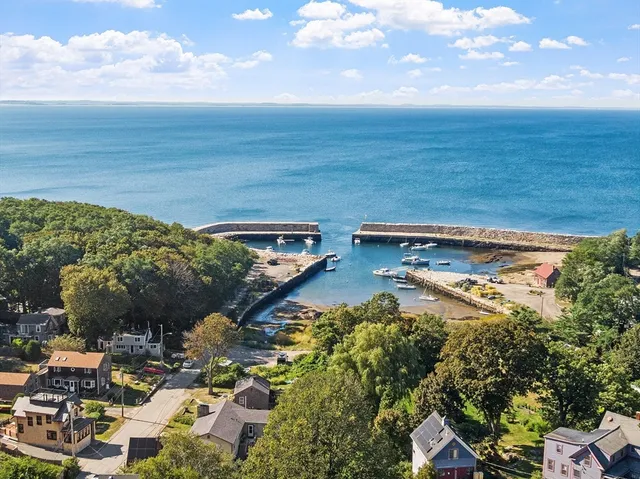 a view of a lake with a yard