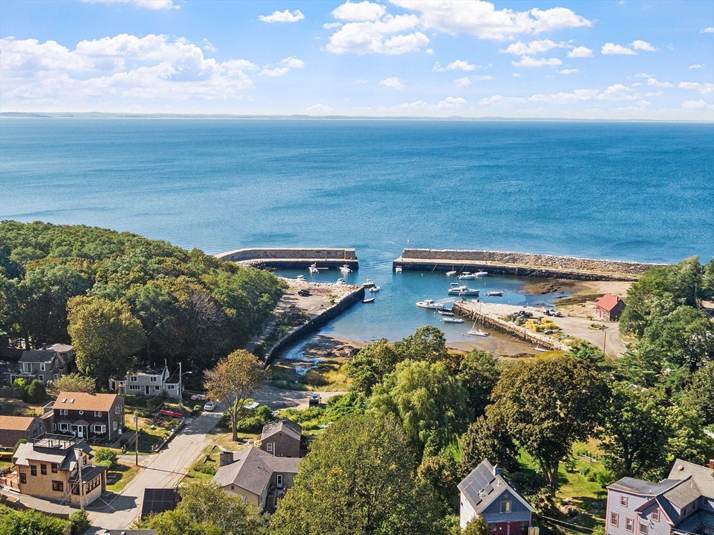 1101 Washington Street, Unit WINTER Gloucester, MA 01930 - Photo 40 of 41 a view of a lake with a yard