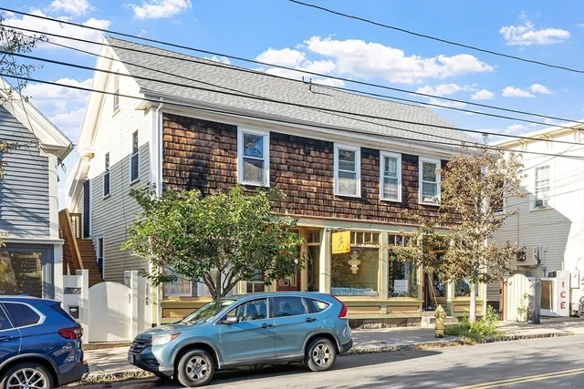 a car parked in front of a building