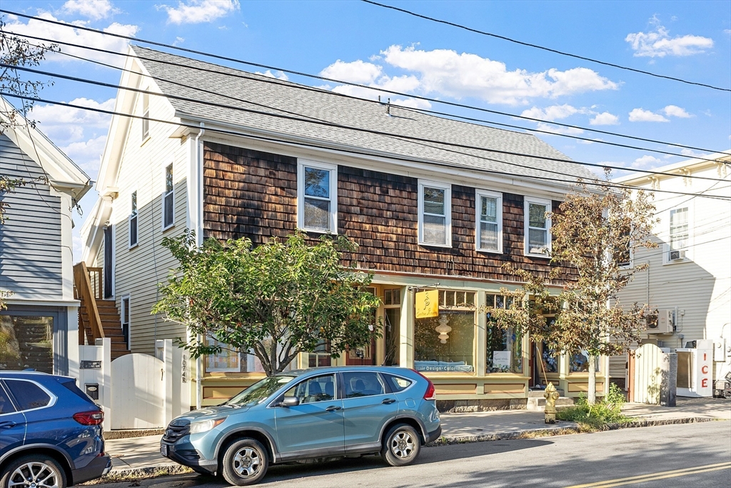 1101 Washington Street, Unit WINTER Gloucester, MA 01930 - Photo 10 of 41 a car parked in front of a building