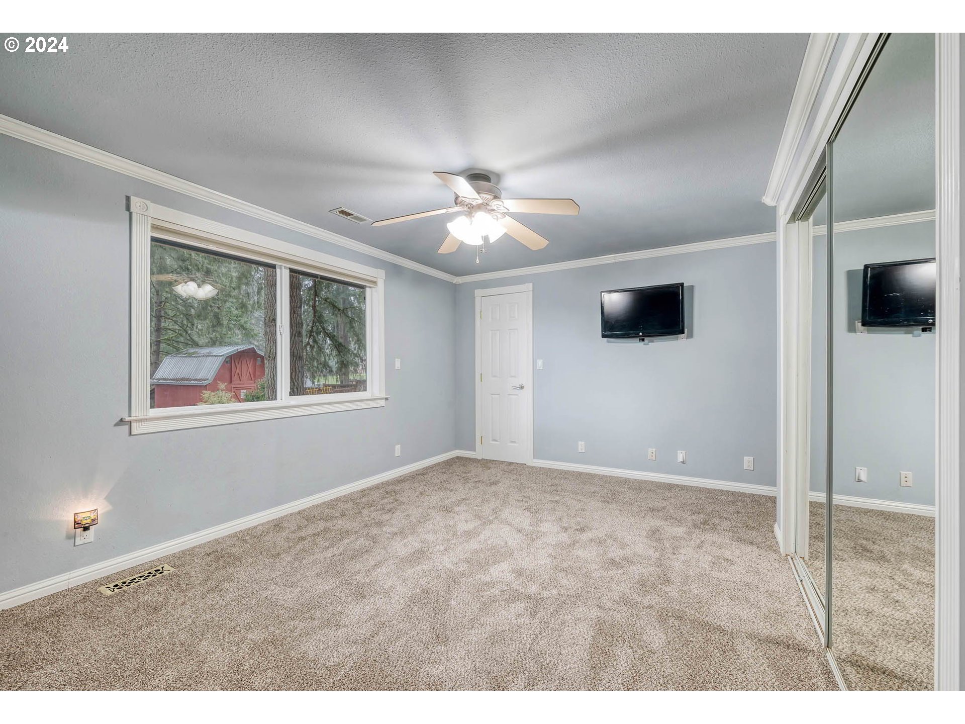 39949 Deerhorn Road Springfield, OR 97478 - Photo 18 of 47 a view of an empty room with a window