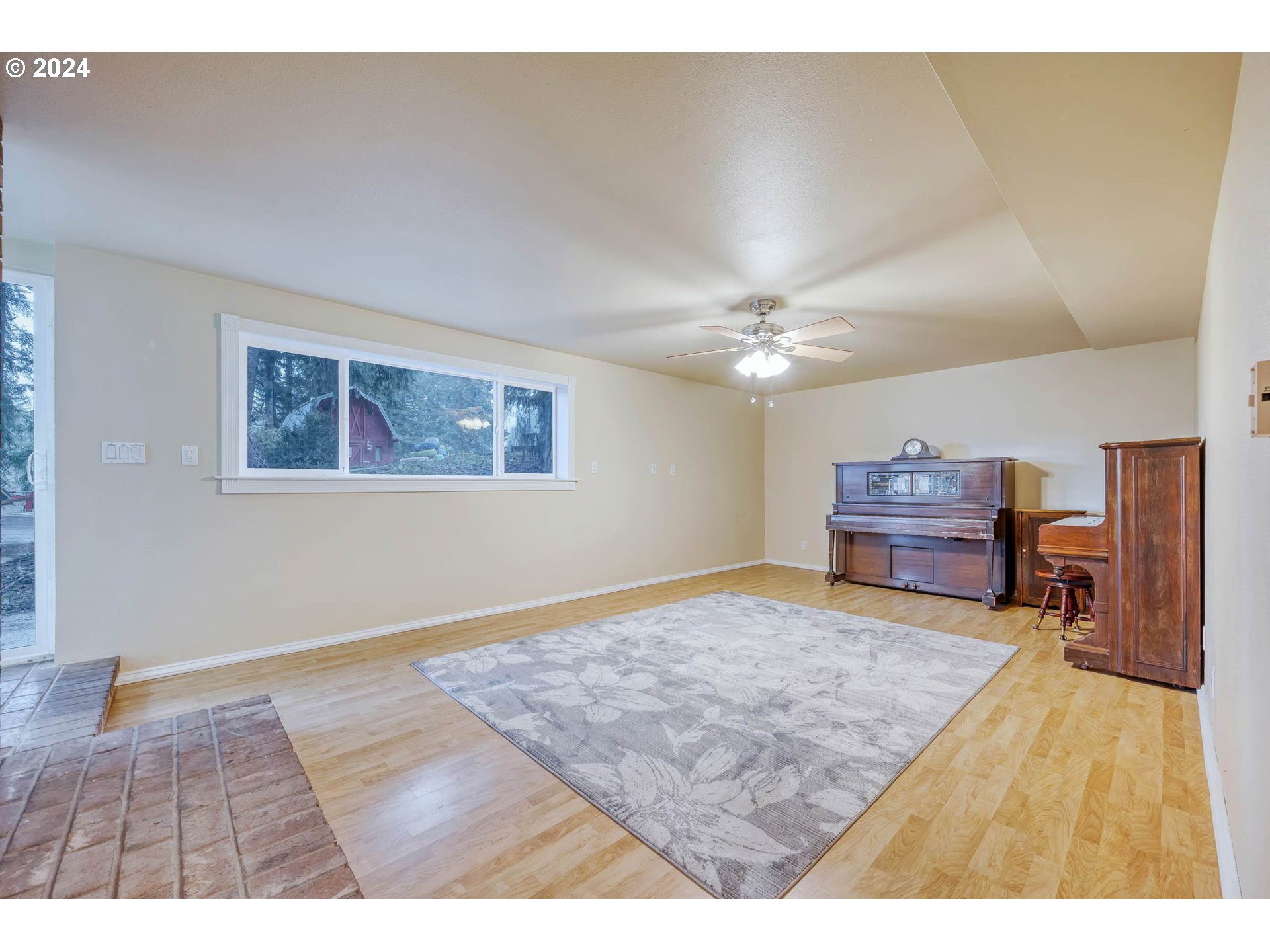 39949 Deerhorn Road Springfield, OR 97478 - Photo 23 of 47 a living room with furniture and a wooden floor