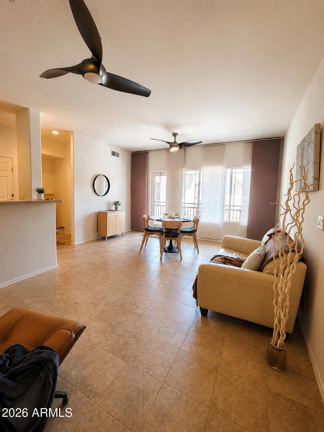 2150 West Alameda Road, Unit 1020 Phoenix, AZ 85085 - Photo 10 of 35 a living room with furniture and a window
