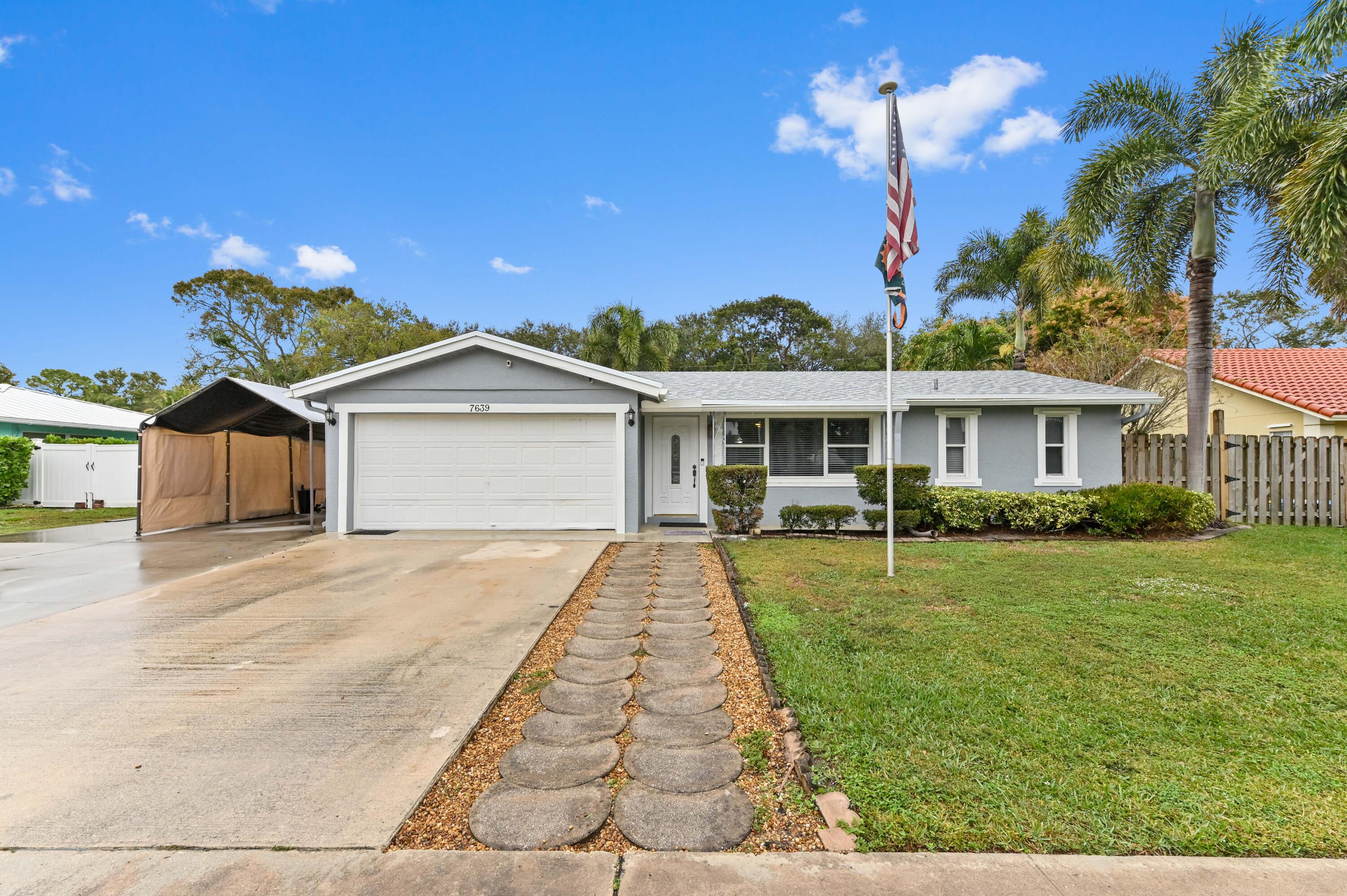 7639 St Andrews Road Lake Worth, FL 33467 - Photo 1 of 37 02 Front 02