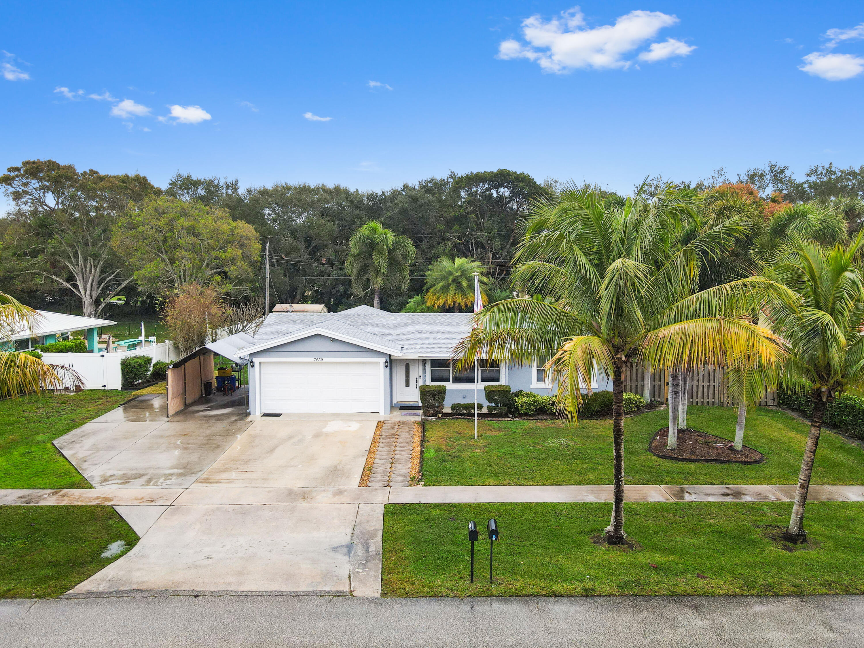 7639 St Andrews Road Lake Worth, FL 33467 - Photo 28 of 37 33 drone 01