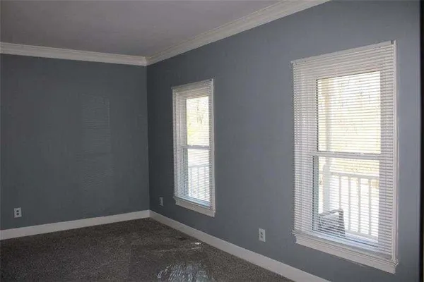 an empty room with windows