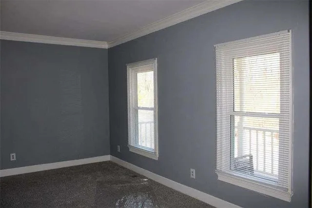 an empty room with windows