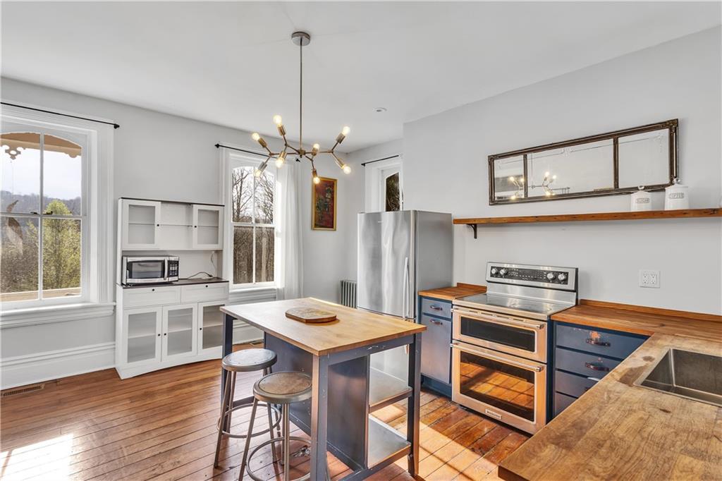 389 East Rices Landing Road East Millsboro, PA 15433 - Photo 14 of 42 This farm kitchen has all the modern amenities while still retaining a country charm.