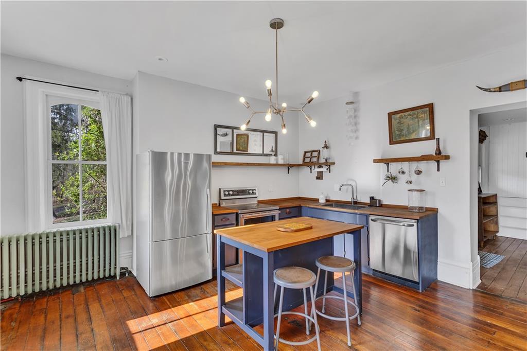 389 East Rices Landing Road East Millsboro, PA 15433 - Photo 15 of 42 This charming farm kitchen blends timeless character with modern comfort while offering natural light and the beauty of the outdoors right outside your windows.