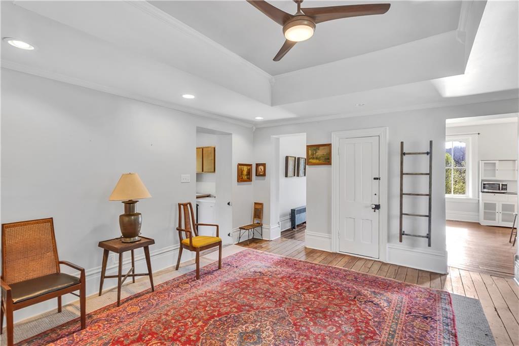 389 East Rices Landing Road East Millsboro, PA 15433 - Photo 19 of 42 This living room is bright and airy as is the entirety of the home, making it a great gathering space in the afternoon and a comfortable family space in the evening.