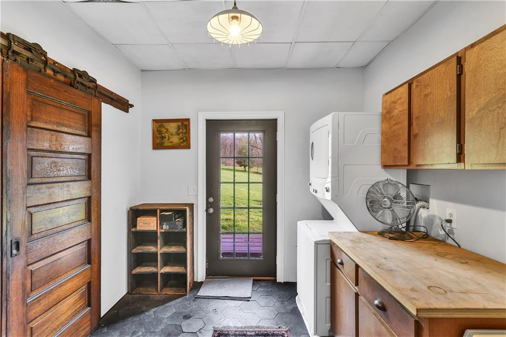 389 East Rices Landing Road East Millsboro, PA 15433 - Photo 23 of 42 Laundry room. Through the barn doors, a second bathroom could be added.