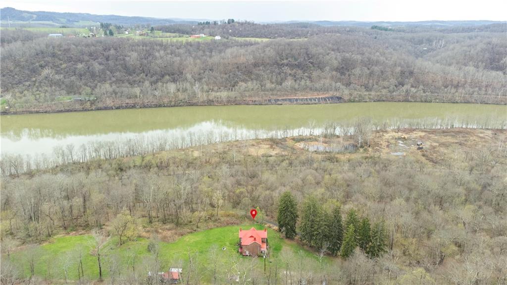 389 East Rices Landing Road East Millsboro, PA 15433 - Photo 36 of 42 Aerial view of the farmhouse and the river beyond. Almost 10 acres of natural beauty and charm.