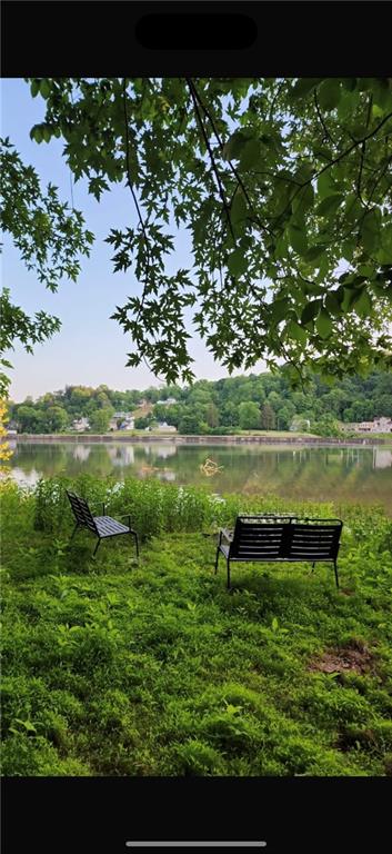 389 East Rices Landing Road East Millsboro, PA 15433 - Photo 41 of 42 Approximately 500 feet of waterfront property perfect for kayaking, fishing, boating, or just gathering around a fire at the end of the day and relaxing with friends.