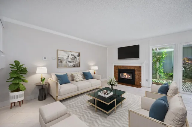 a view of a room with wooden floor and balcony