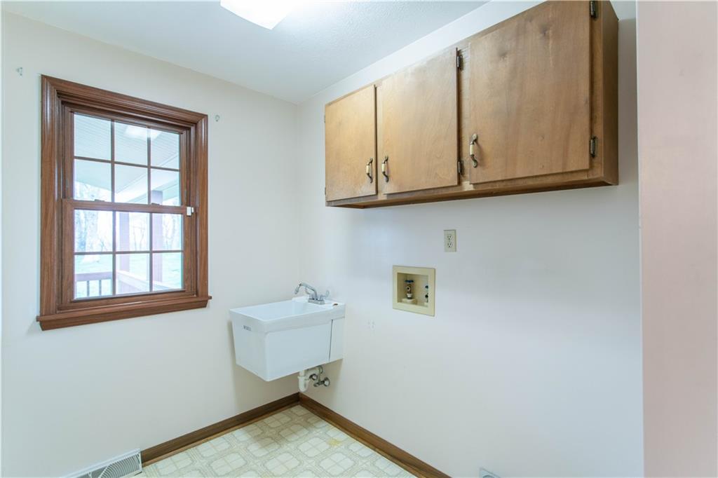 128 Moffett Run Road Aliquippa, PA 15001 - Photo 22 of 48 a room with storage and utility