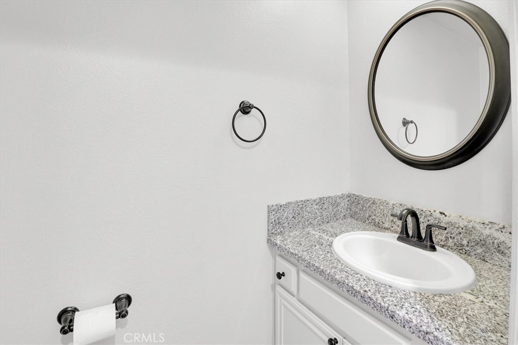 5610 Las Virgenes Road, Unit 50 Calabasas, CA 91302 - Photo 19 of 40 a bathroom with a granite countertop double vanity sink and a mirror