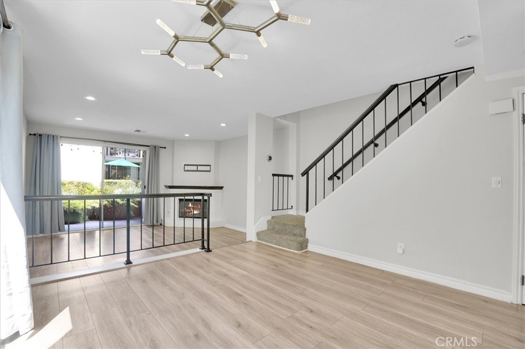 5610 Las Virgenes Road, Unit 50 Calabasas, CA 91302 - Photo 9 of 40 a view of entryway and hall with wooden floor