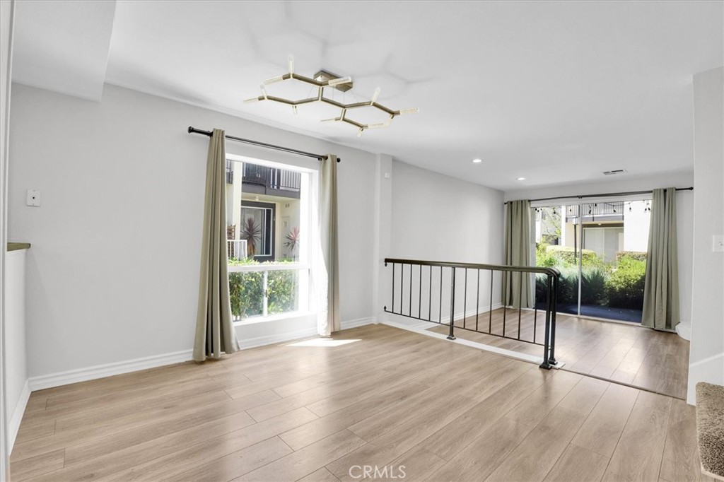 5610 Las Virgenes Road, Unit 50 Calabasas, CA 91302 - Photo 10 of 40 a view of an entryway with wooden floor