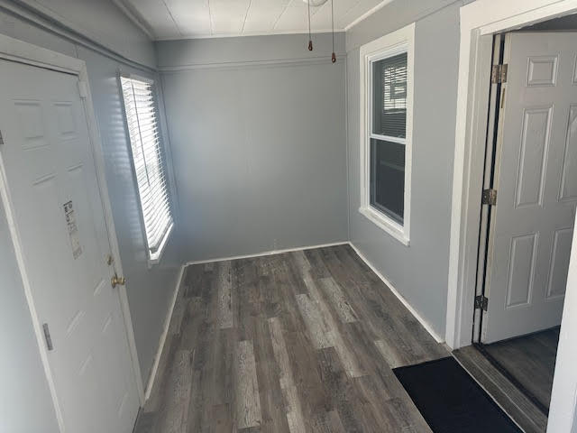 506 East 144th Place Dolton, IL 60419 - Photo 19 of 37 a view of an empty room with wooden floor and a window