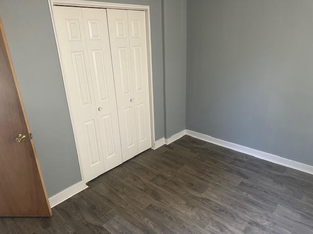 506 East 144th Place Dolton, IL 60419 - Photo 30 of 37 a view of an empty room with wooden floor