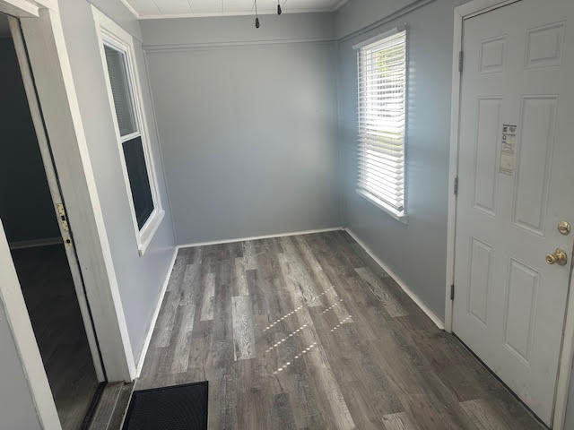 506 East 144th Place Dolton, IL 60419 - Photo 34 of 37 a view of a room with wooden floor and window