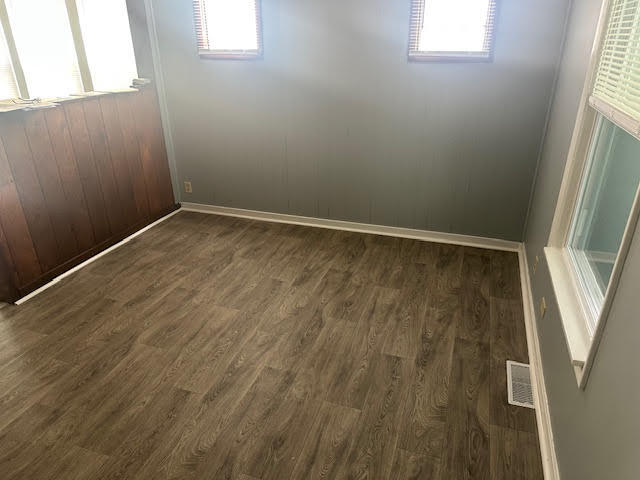 506 East 144th Place Dolton, IL 60419 - Photo 37 of 37 wooden floor in an empty room with a window