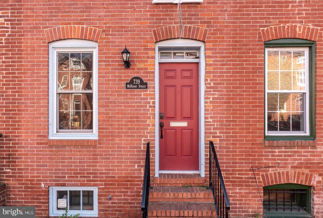 739 McHenry Street Baltimore, MD 21230 - Photo 2 of 30 Making a statement with a bright red door!