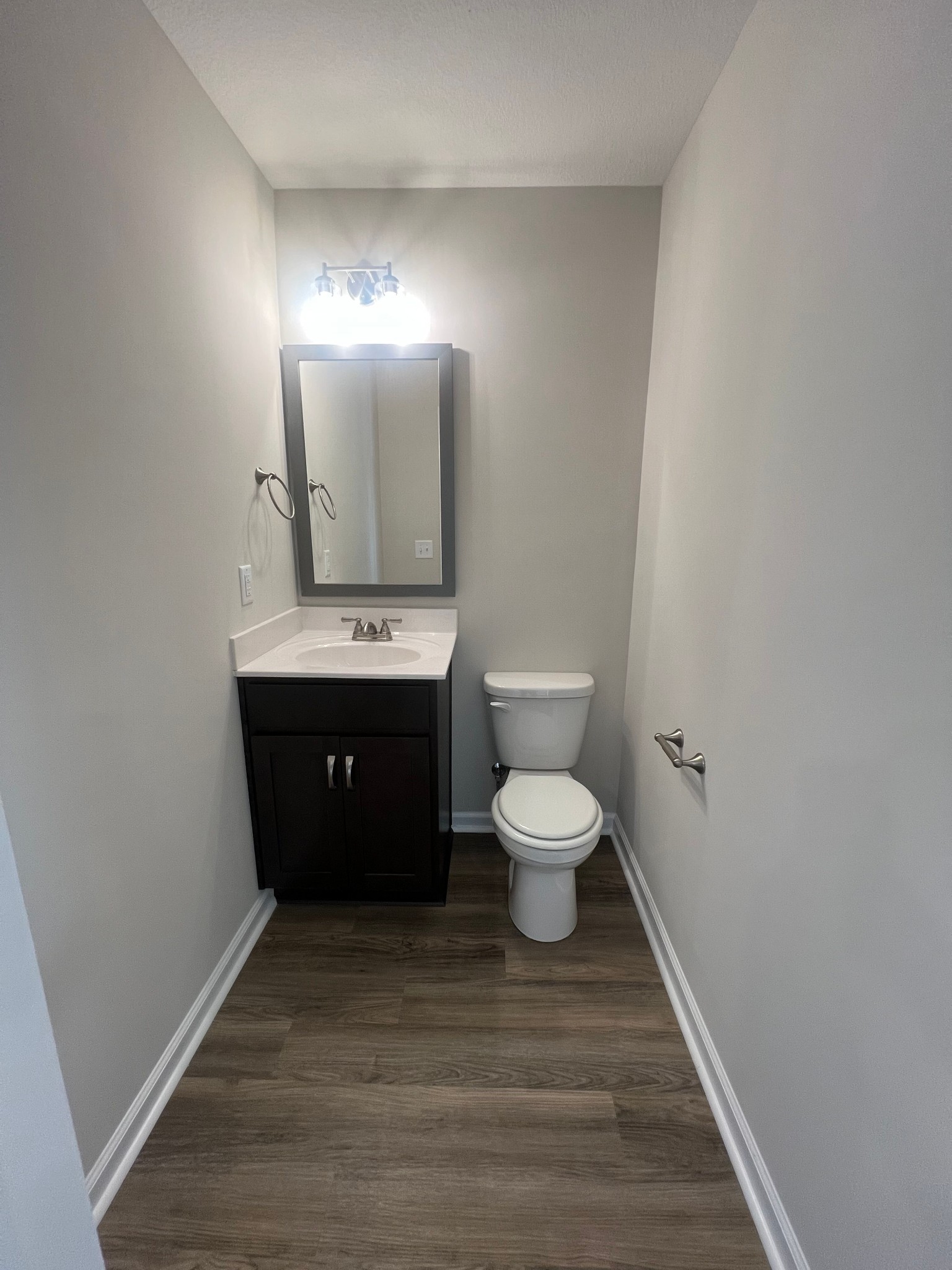 1130 Pembroke Oak Grove Road, Unit 1 Oak Grove, KY 42262 - Photo 13 of 37 a bathroom with a toilet sink and mirror