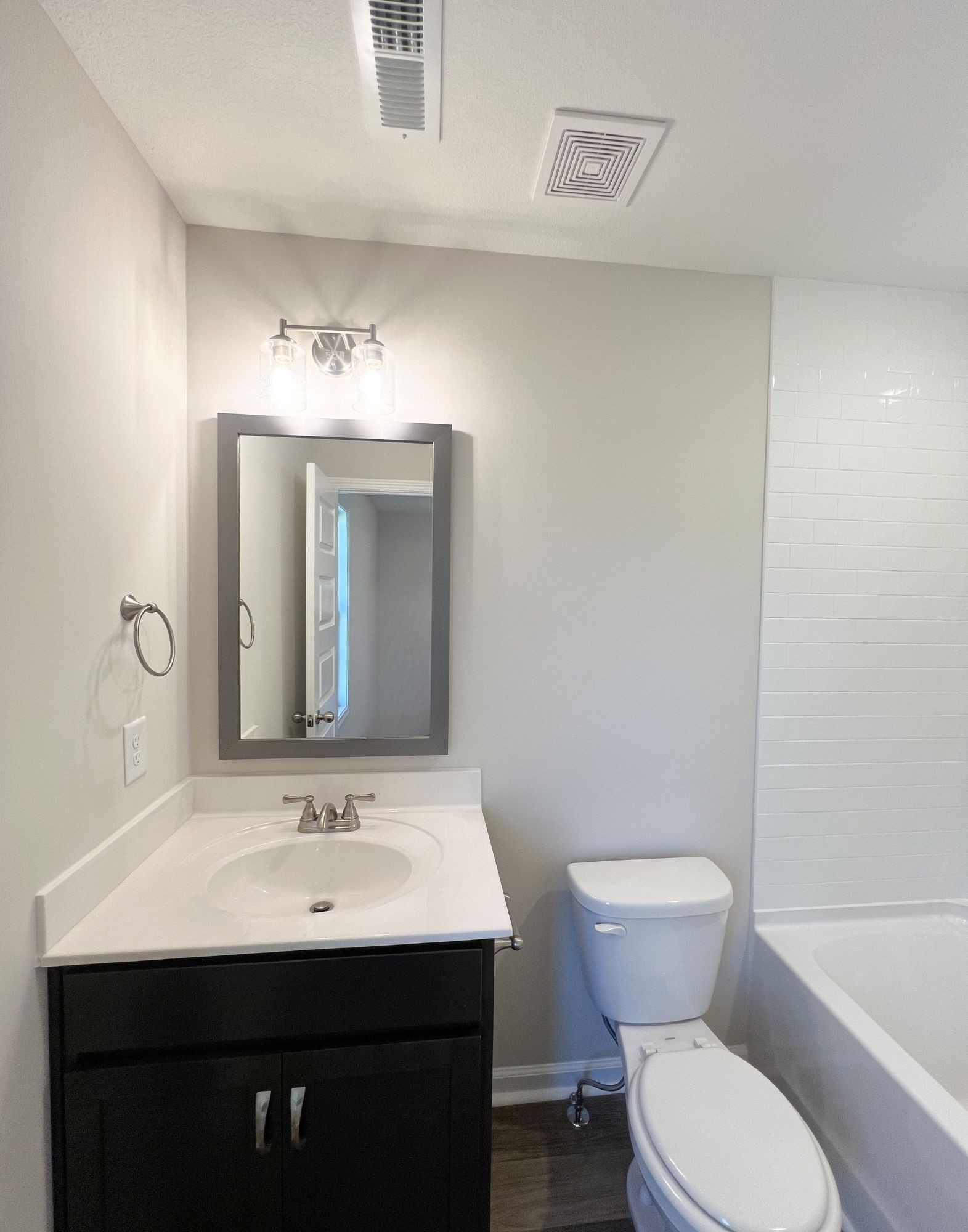 1130 Pembroke Oak Grove Road, Unit 1 Oak Grove, KY 42262 - Photo 23 of 37 a bathroom with a toilet sink and mirror