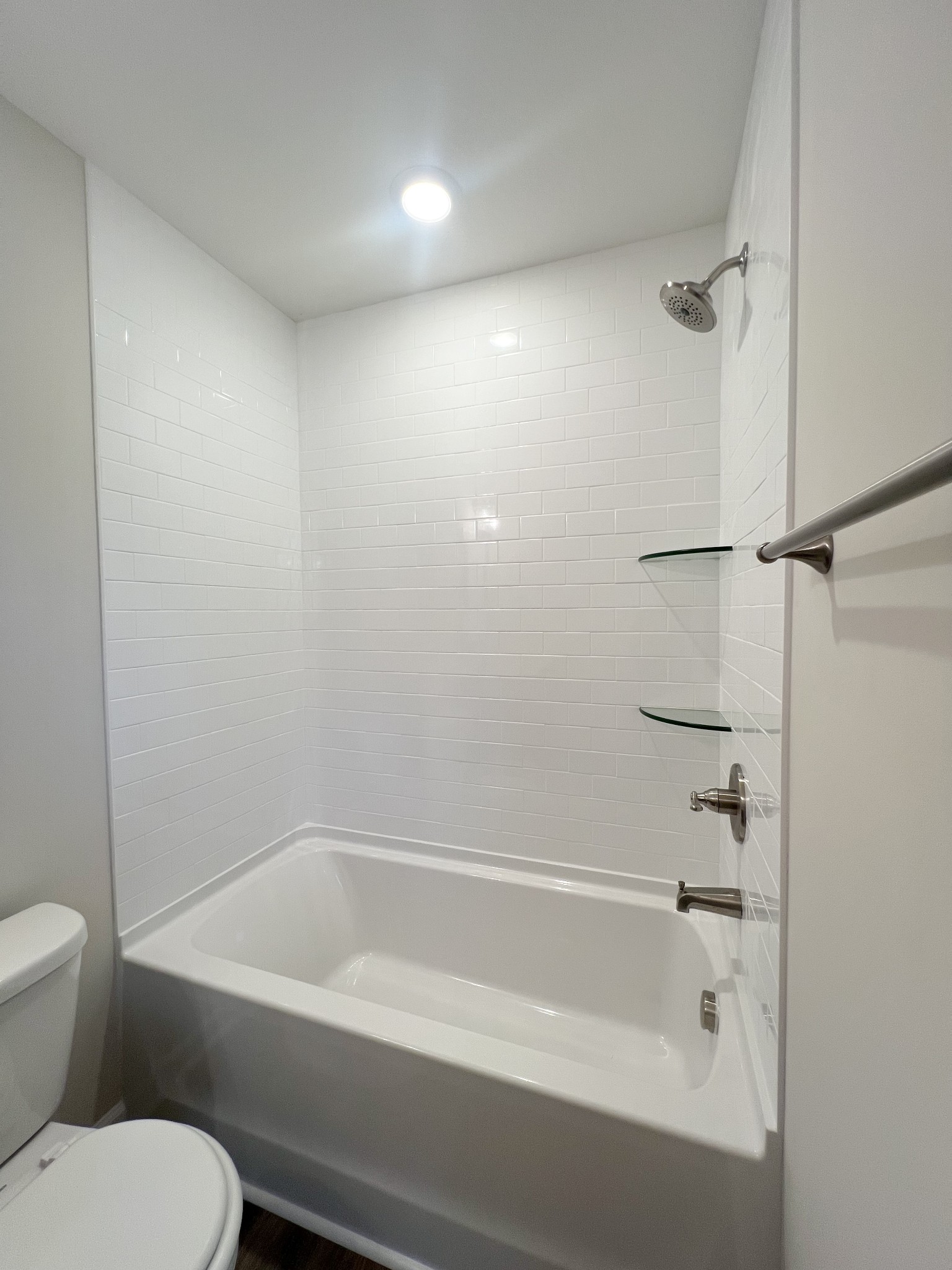 1130 Pembroke Oak Grove Road, Unit 1 Oak Grove, KY 42262 - Photo 24 of 37 a white bath tub sitting next to a toilet