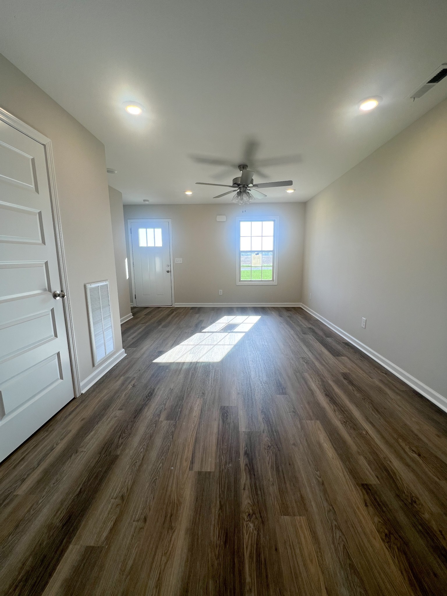 1130 Pembroke Oak Grove Road, Unit 1 Oak Grove, KY 42262 - Photo 4 of 37 wooden floor in an empty room with a window