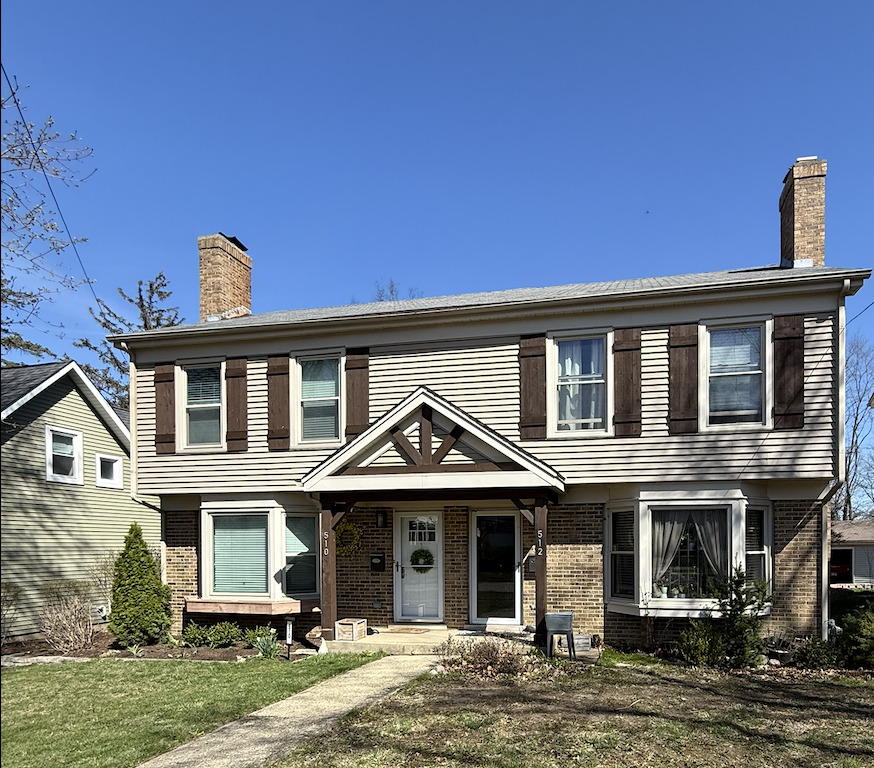 512 East Russell Street Barrington, IL 60010 - Photo 1 of 1 a front view of a house with garden