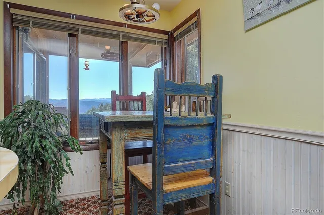 a view of balcony with furniture