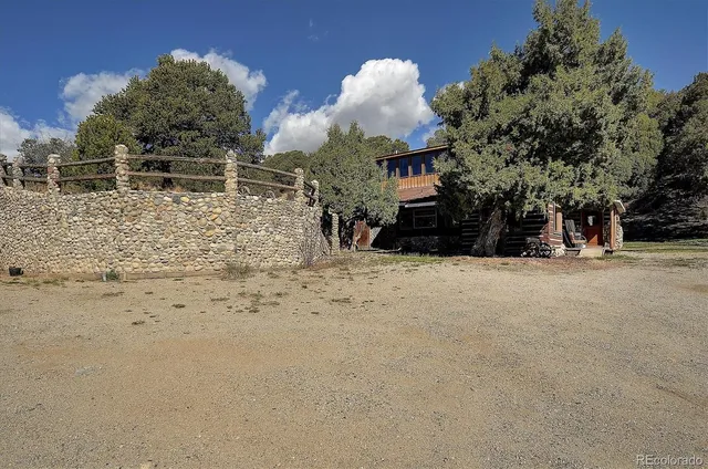 a view of a covered with snow in the yard