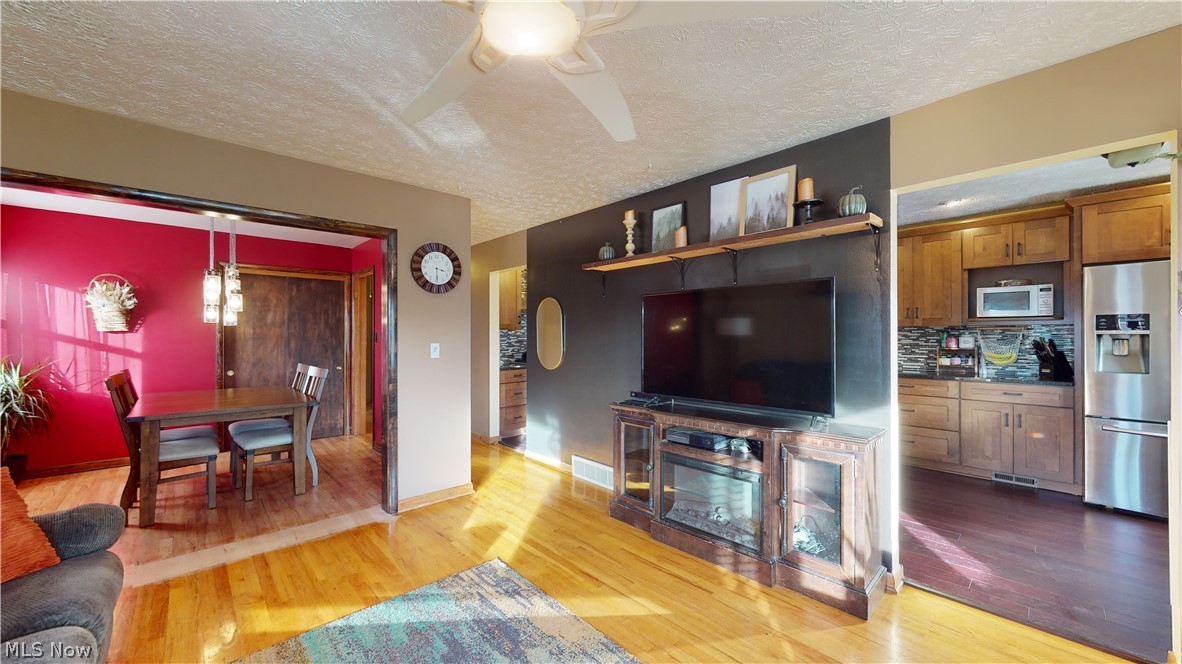 1627 Romona Road Akron, OH 44305 - Photo 5 of 35 view of living room, dining room and part of kitchen.