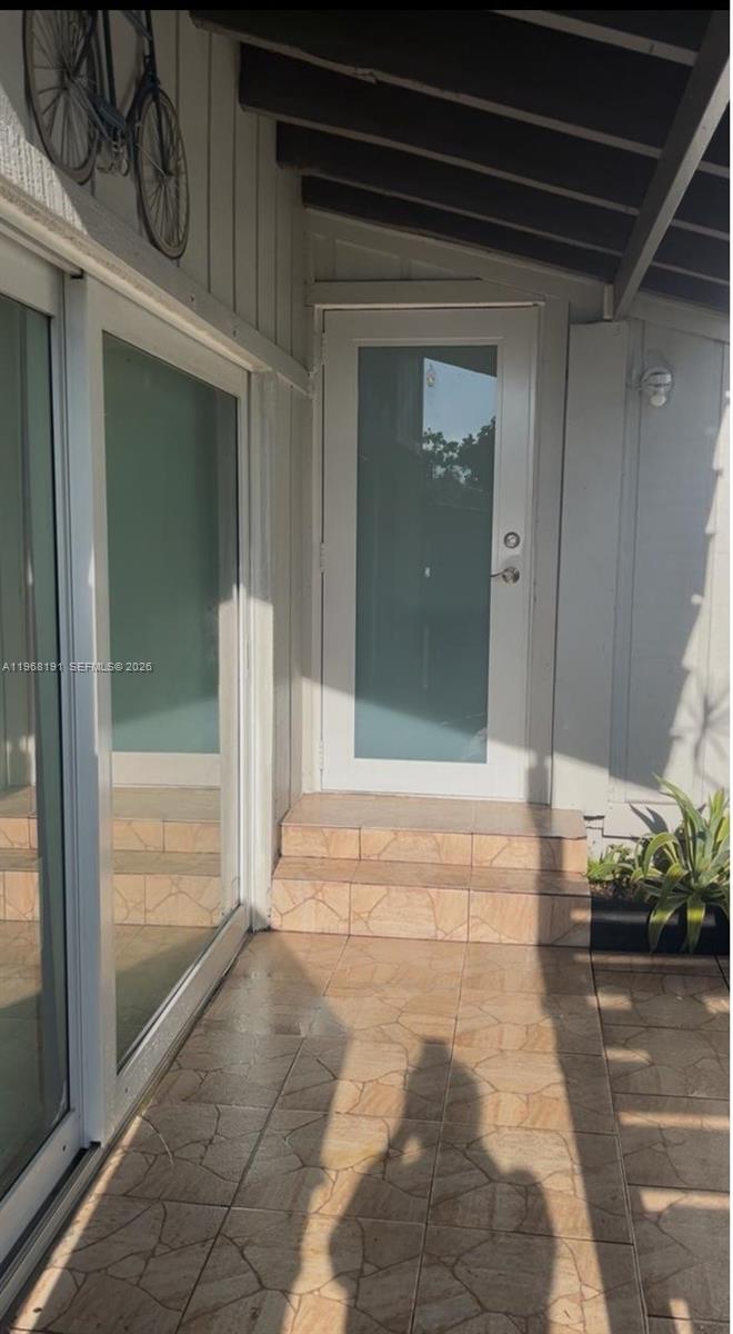 a view of a entryway door front of house