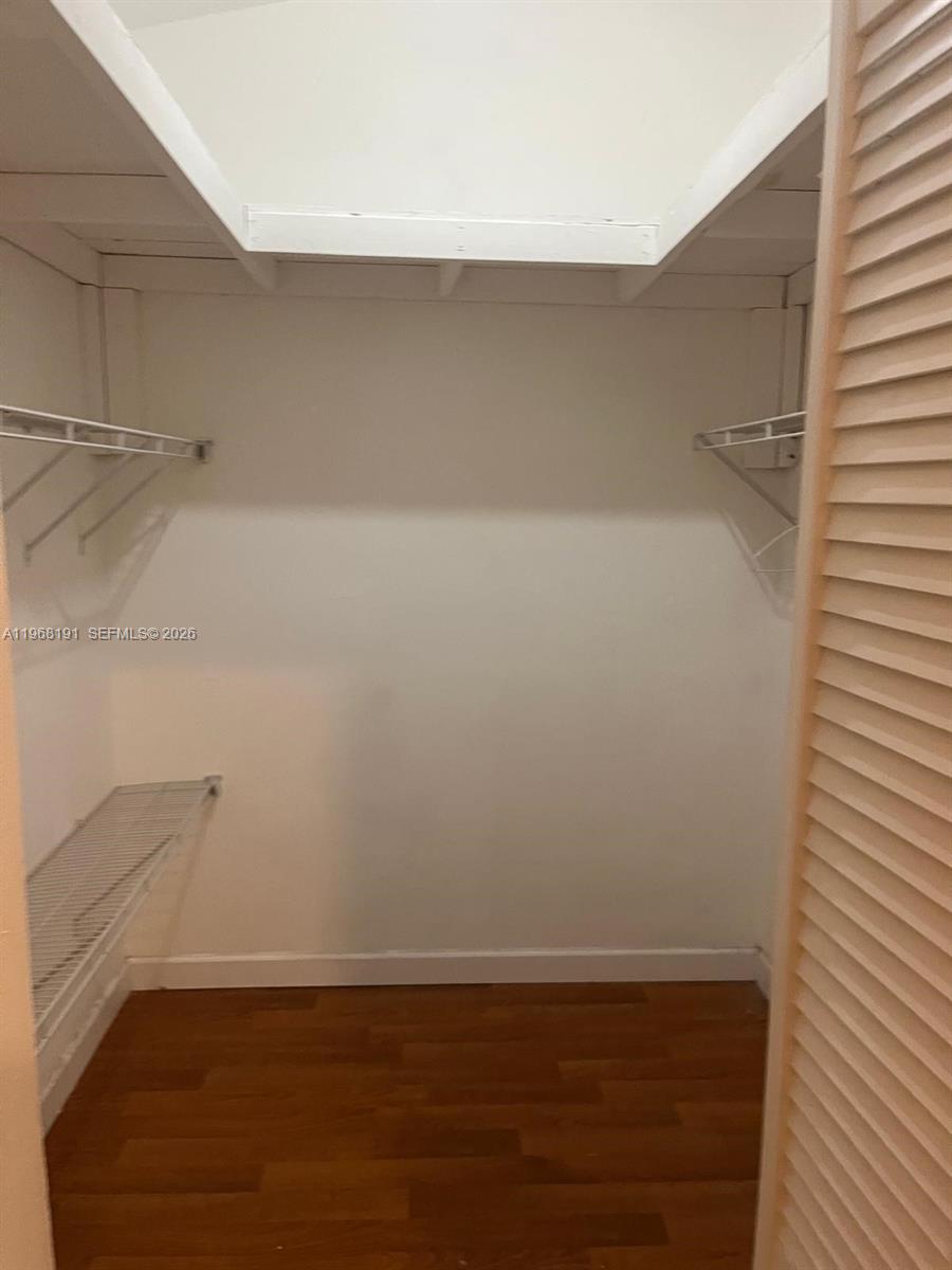7133 Southwest 109th Court Miami, FL 33173 - Photo 12 of 13 a view of small space with racks on the wall