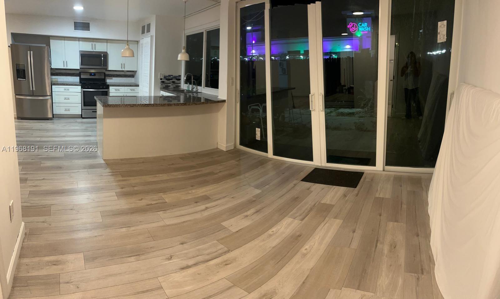 7133 Southwest 109th Court Miami, FL 33173 - Photo 5 of 13 a view of kitchen with refrigerator sink and stove