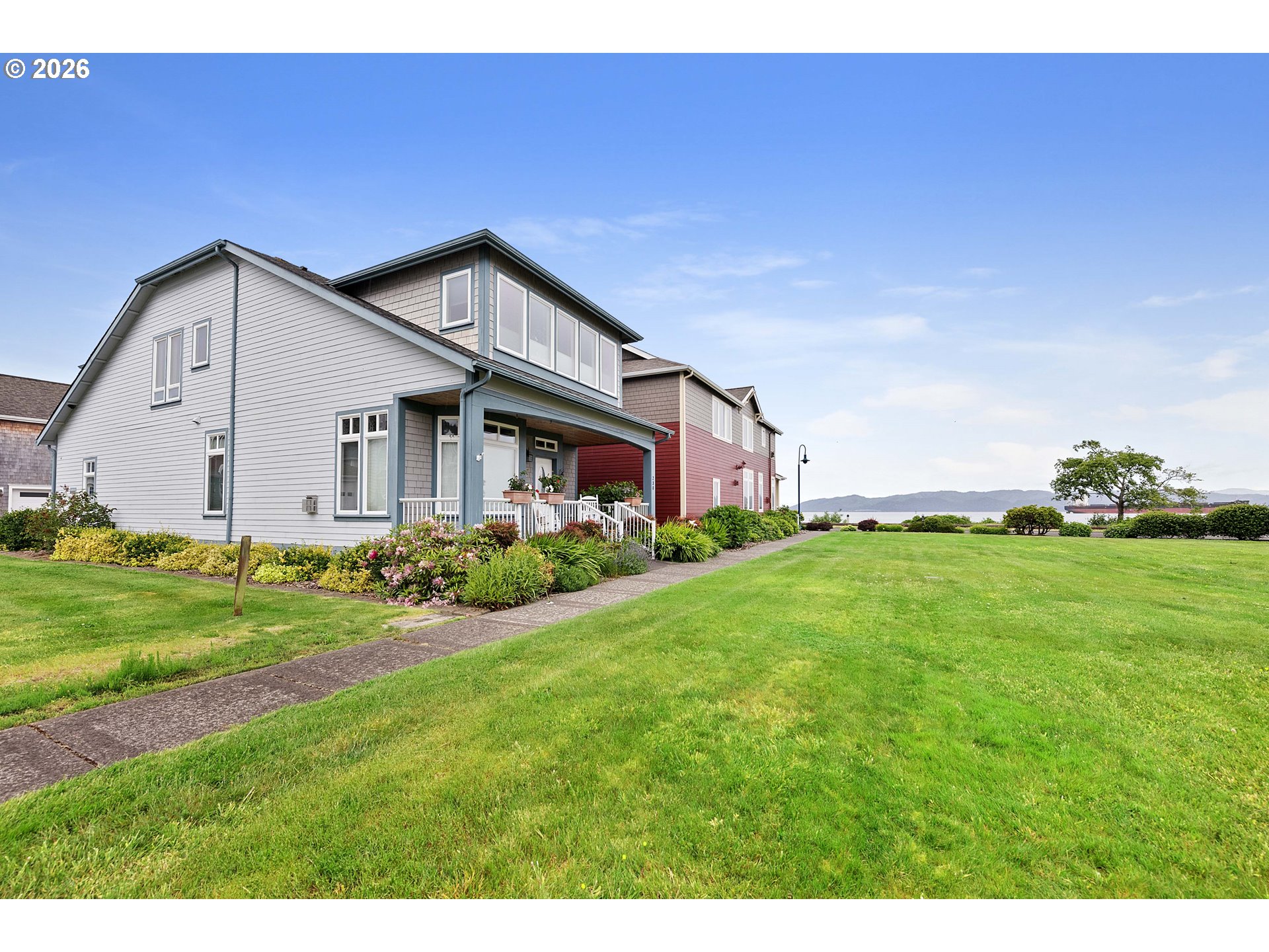 230 Round House Road Astoria, OR 97103 - Photo 36 of 43 a view of a house with backyard and garden