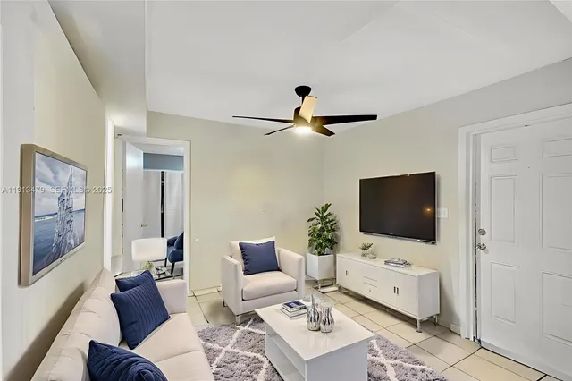 a living room with furniture and a window