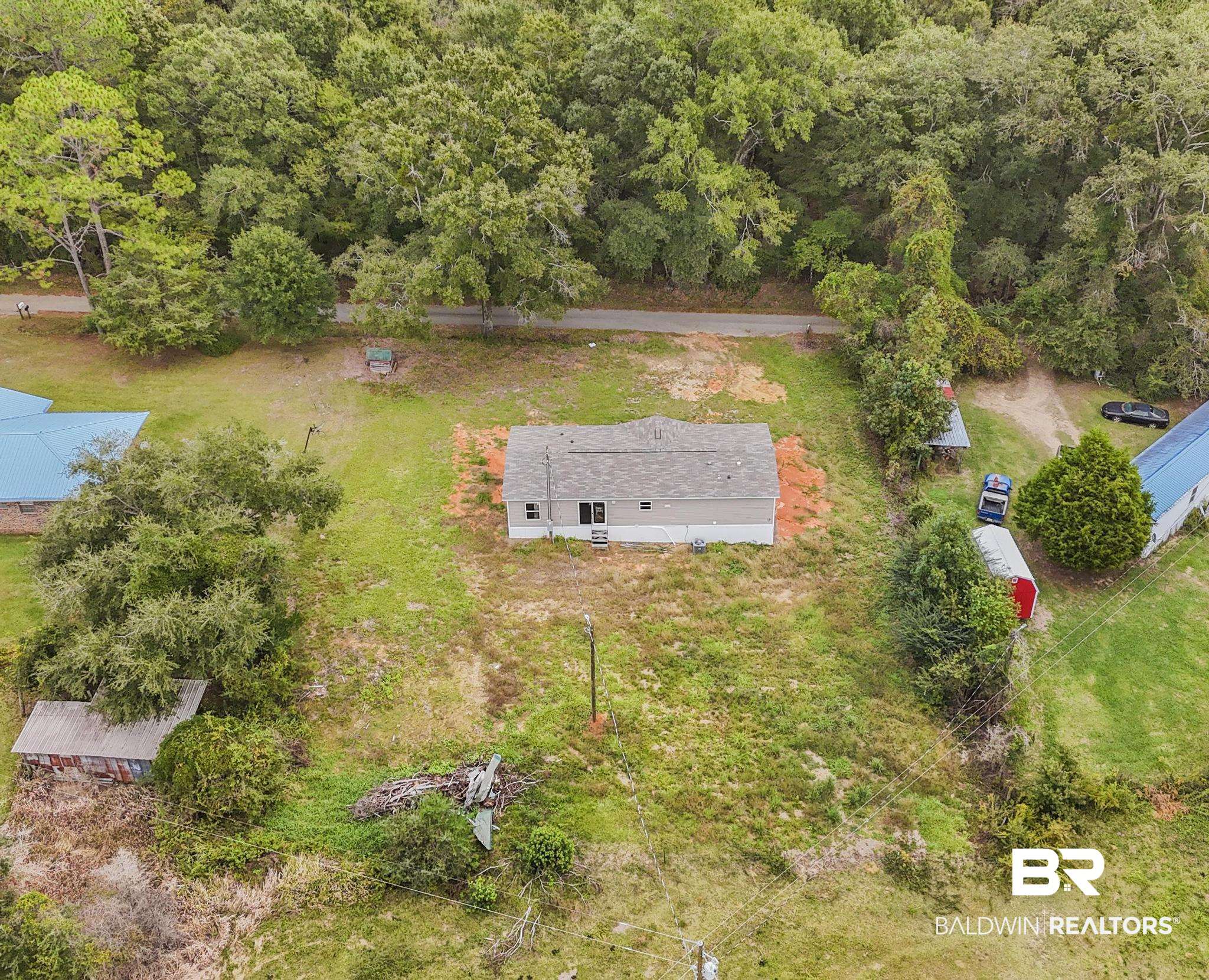 54309 Klasnich Road Perdido, AL 36562 - Photo 28 of 29 Aerial view of property and surrounding area