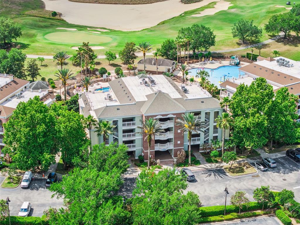 7602 Sandy Ridge Drive, Unit 103 Reunion, FL 34747 - Photo 38 of 61 an aerial view of a residential houses with outdoor space and street view